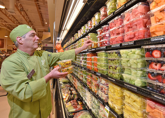 pickandprephoststockingshelveswithfreshfruit